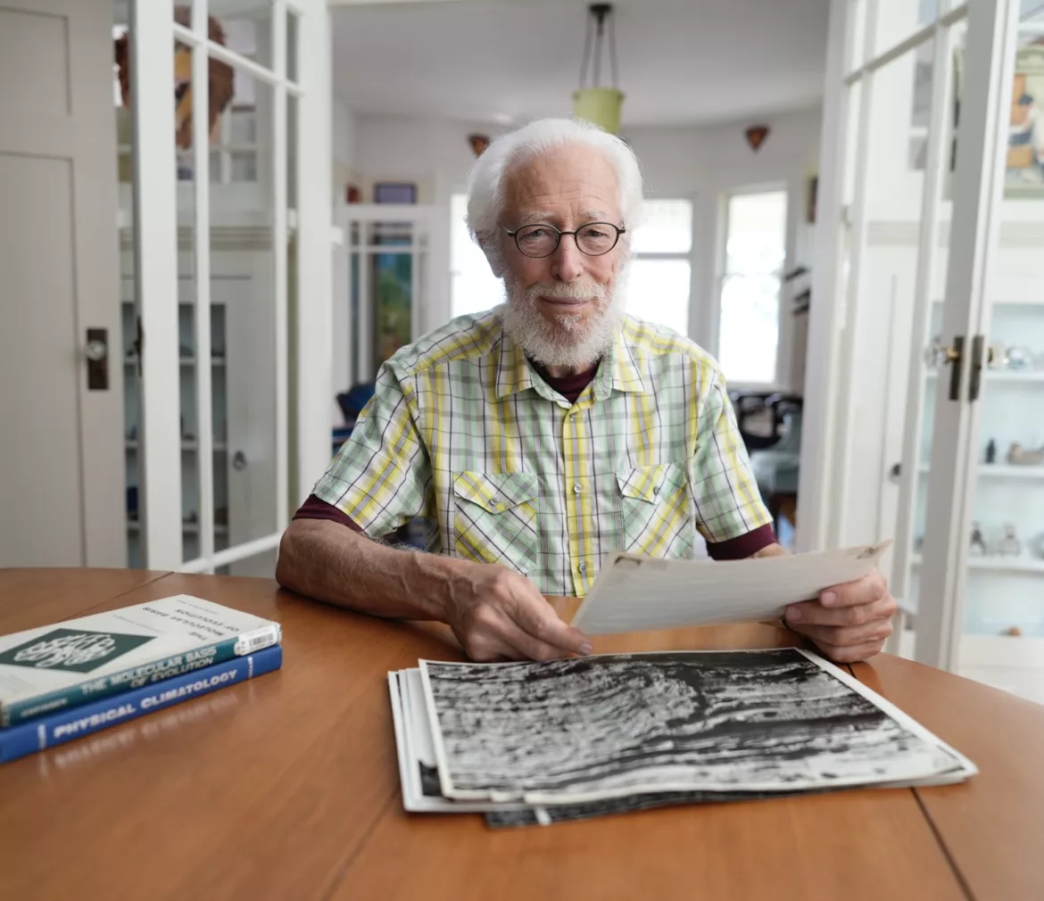 Paul F Hoffman sitting at his desk